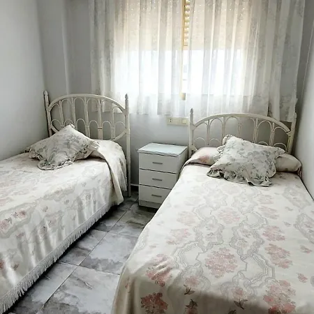 Confortable En La *